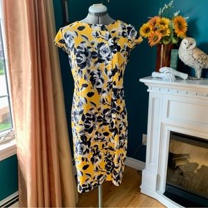 Yellow shirt sleeve dress with flowers